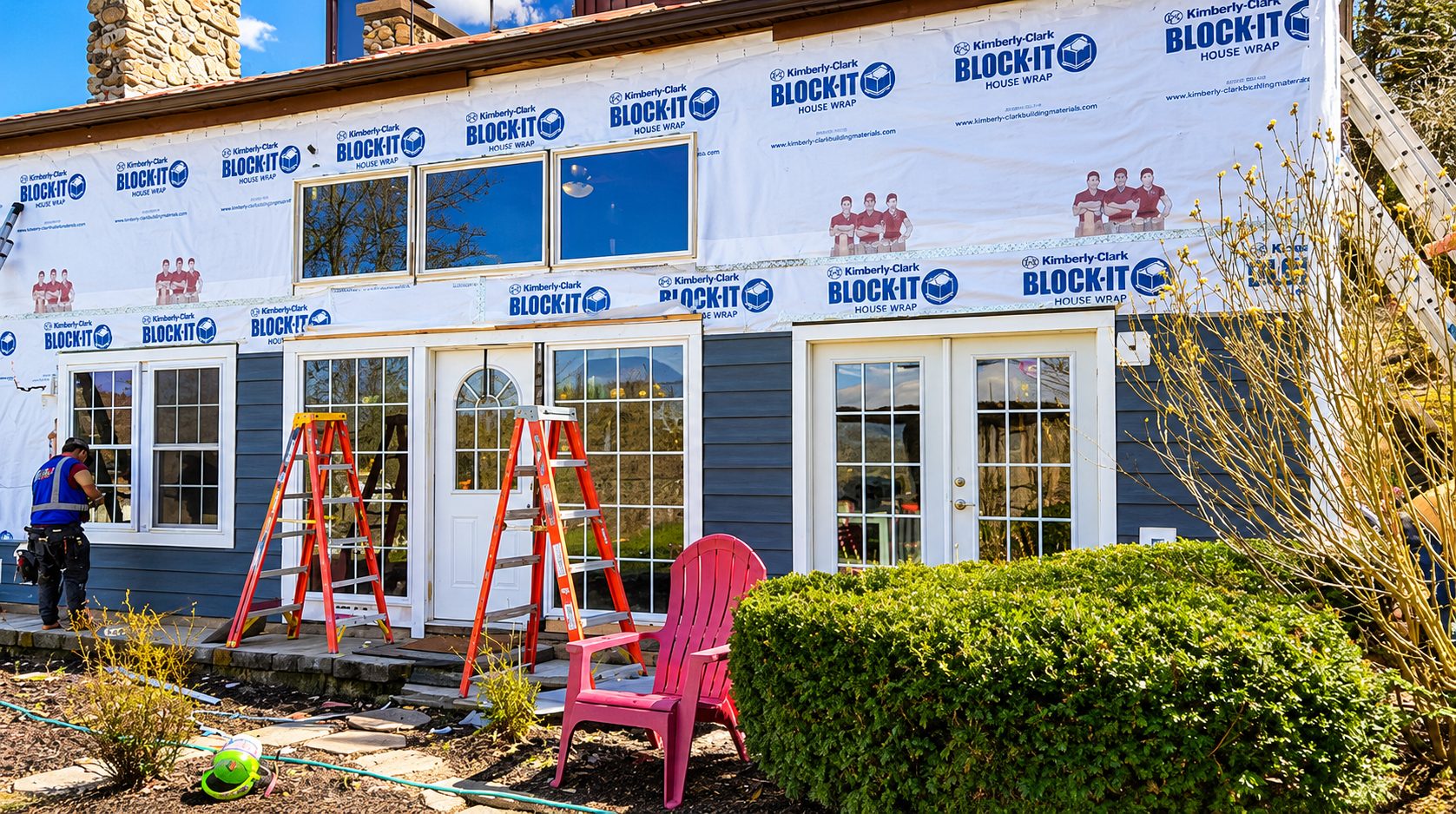 House wrap installed over the sheathing before new siding
